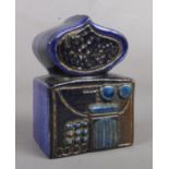 A Gustavsberg sculpture by Bertl Vallien. Formed as a temple, glazed in blue and black. 11cm tall.