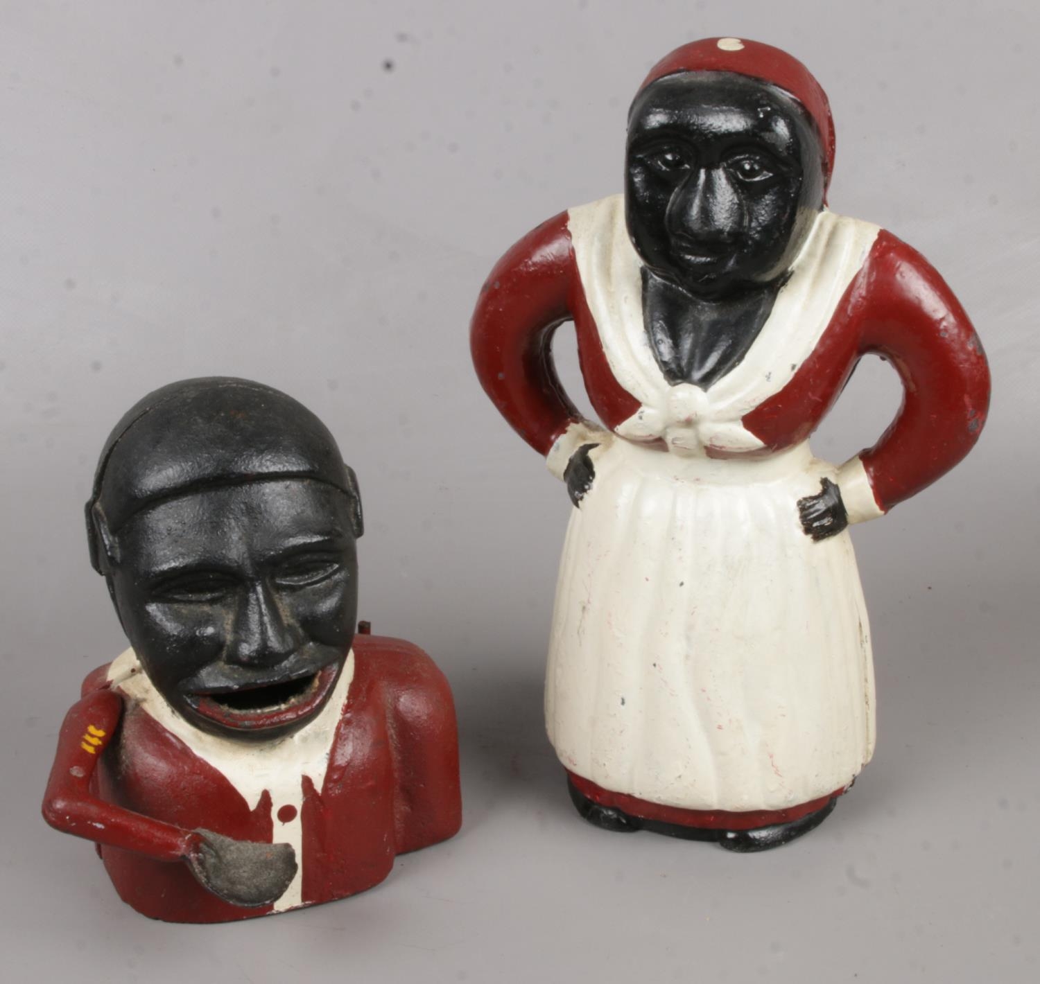 Two Novelty Cast Iron Money Boxes, depicting Black Figures, one with Moving Arm.