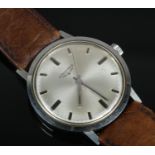 A Longines stainless steel manual wristwatch. 3.5cm diameter without crown. Running.
