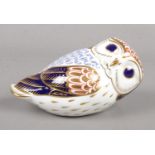 A Royal Crown Derby Owl paperweight. with gold stopper.