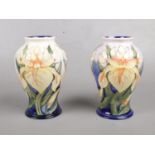 Two Moorcroft 'Windrush' vases. By Debbie Hancock. 16.5cm height. Good condition.