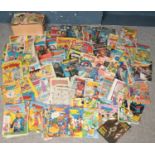 A large quantity of comics and annuals. Including Beano, Dandy, Marvel, Scooby Doo, Beezer, etc.