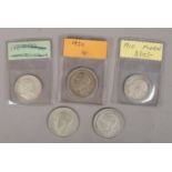 A collection of British pre decimal coins. Includes two Edward VII Florins (1910) and three George V