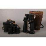 Two cased pairs of binoculars. To include a WW2 pair of Barr & Stroud Royal Navy Binoculars no 85216