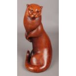 A Large Border Fine Arts Polished Wooden Sculpture of an Otter. 33cm High.