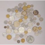 A quantity of mostly white metal coins. Including USA One dollar, German examples, Georgian coin,