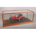 A Maxitoys Oldtimer-Model car in a glass display-case. Comprising of pressed metal large scale model