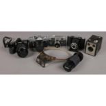 An Assortment of Cameras and Photographic Equipment. To include a Minolta 3000i Camera with