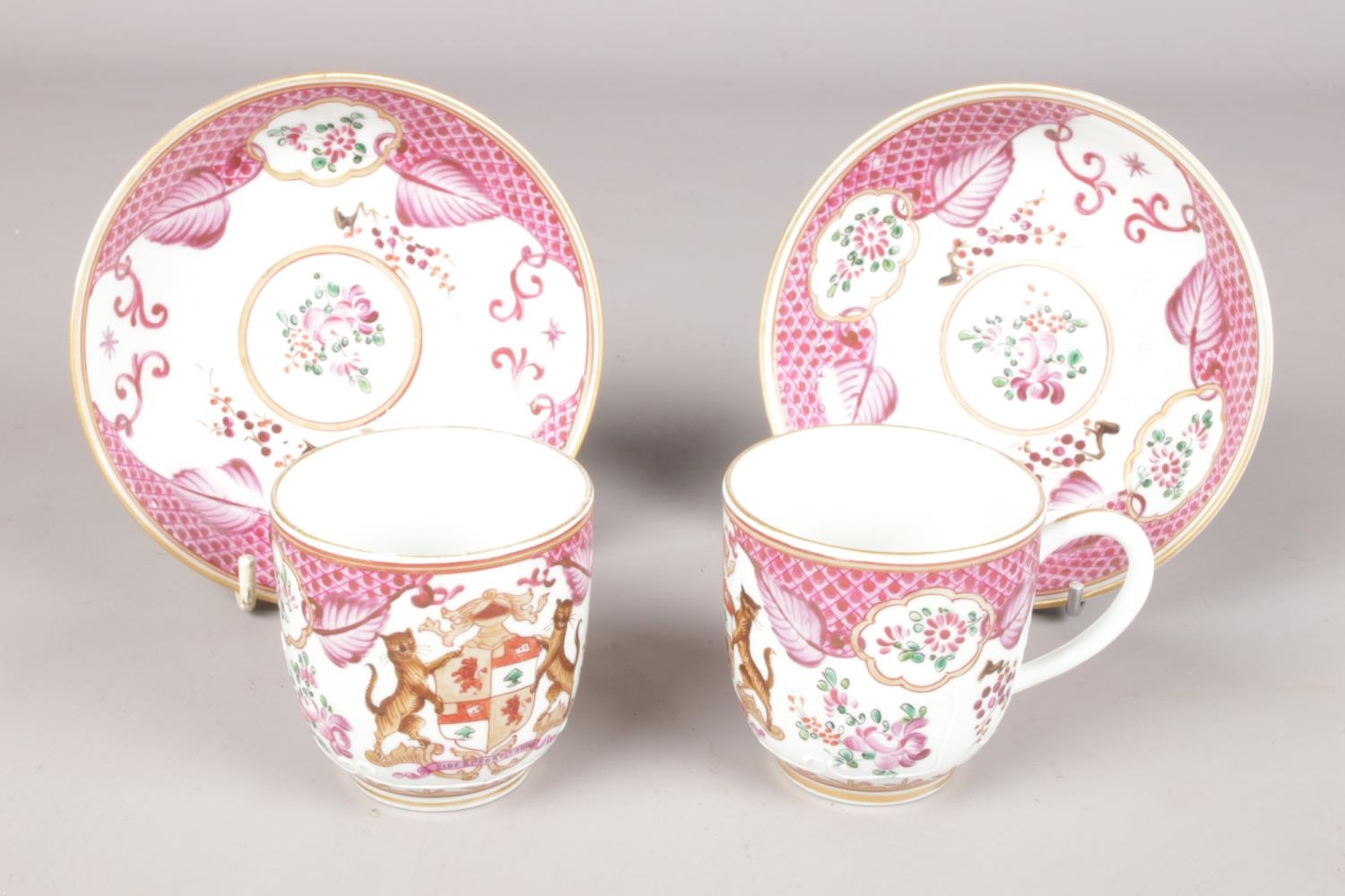 A matching pair of hand-painted 19th century Samson porcelain cups and saucers. Painted in the