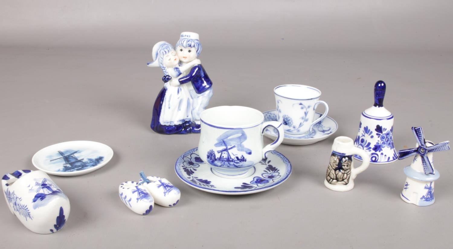 A collection of assorted ceramic's. mainly Delft ware, cup/saucer, figurine, pin dish etc