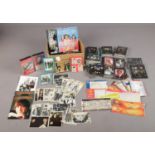 An extensive selection of 'Beatles' collectables. To include trading cards, postcards, magazines &