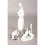 Two Lladro Figures, of a Woman holding a Lamb and a Cat and Mouse, together with a Nao (by Lladro)