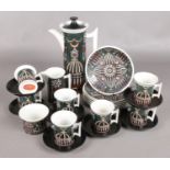 A Twenty-Four Piece Portmeirion 'Magic City' Coffee Set, designed by Susan Williams-Ellis. Chip