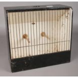 A vintage bird cage. H: 28cm, W:30.5cm, D:15cm.
