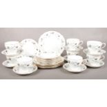 A Colclough part tea set. cups/saucers, plates etc.