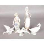 A Collection of Five Lladro Figures, Primarily Focusing on Geese.
