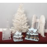 A selection of Christmas decorations. Two Polyresin light up houses, small Christmas tree, Angel