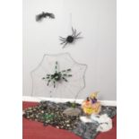 Halloween decorations. Spider's web, spiders, bats, snakes, light up pumpkin, decorative fabric etc.