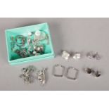 A Tiffany box containing, Silver earrings (12 pairs), jewellery and brooches etc. (Total weight 71.