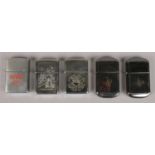 Five Zippo lighters. Including Nasa, inscribed JPS examples, etc.