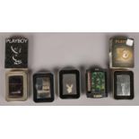 Five Zippo lighters. Including Playboy, Peacock Plumage examples, etc.