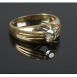 A gold and diamond ring. Size O, 6.17g. Approximately 0.5 carat diamond.