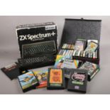 A Sinclair ZX Spectrum + (boxed) & a quantity of games - Knight Lore, Skool Daze, Jet Set Willy,