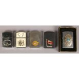 Five Zippo lighters. Including Friendship Loyalty Love example, Canada Niagara Falls, etc.