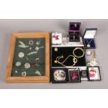 A Framed Collection of Brooches and Stick Pins, together with a Small Selection of Costume