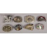 8 vintage metal belt buckles. Including Budweiser, Bargamot American Pegasus example, Tanside, etc.