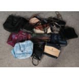 A box of handbags. Including leather examples, etc.