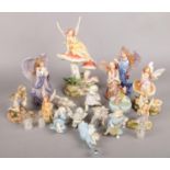 A box of ornamental fairy figures.