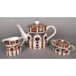 A Royal Crown Derby Old Imari pattern 3 piece teaset. Comprising of teapot, milk jug and lidded