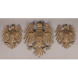 Three cast bronzed Barclays Bank eagle plaques. Includes one large example and a pair of smaller