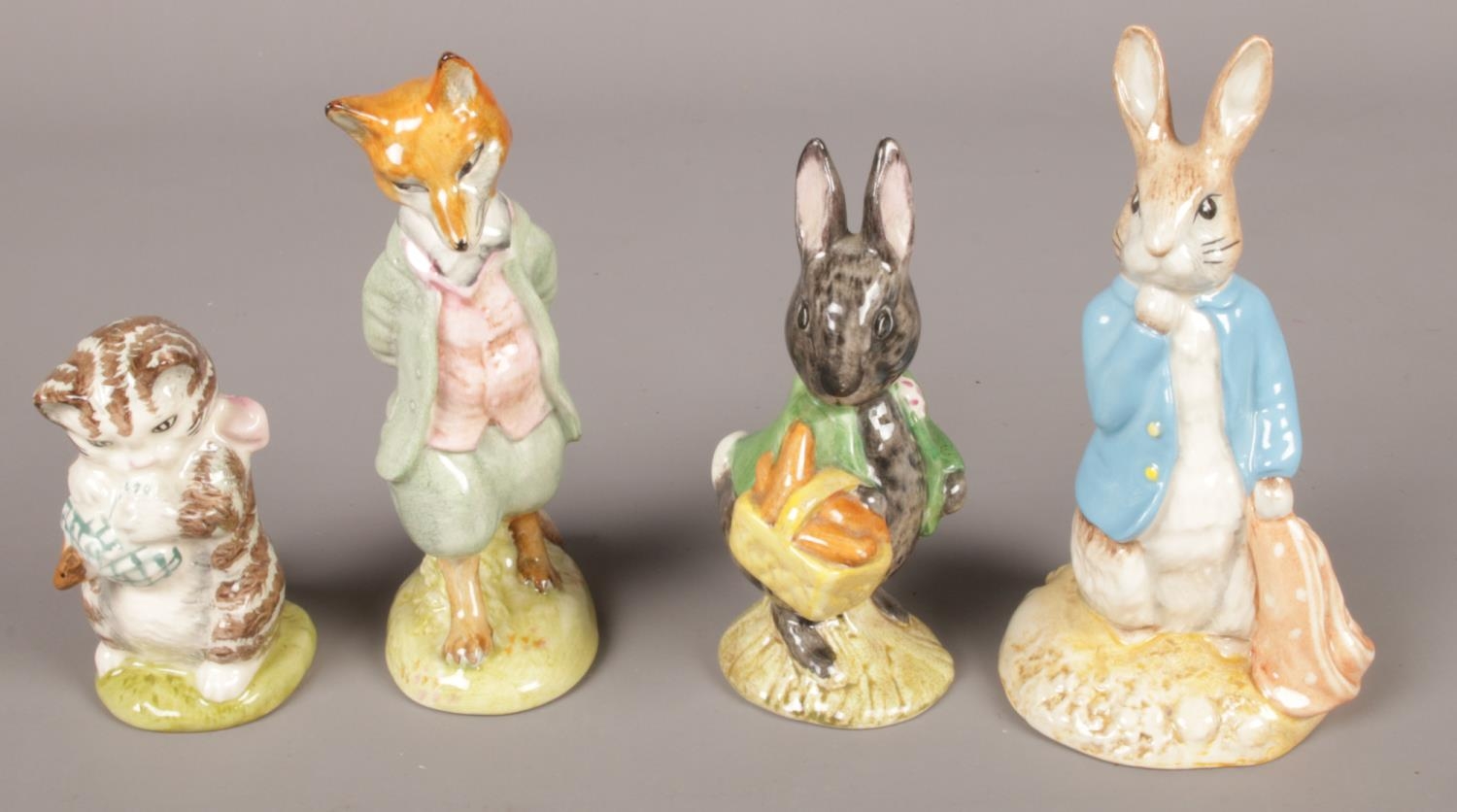 Four Beswick Beatrix Potter ceramic figures. Including Little Black Rabbit, Peter and the Red Pocket