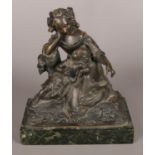 A bronze sculpture of a mother and child raised on marble plinth. 20cm.