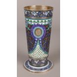A 19th century Russian silver and shaded enamel beaker. Maker's mark for Antip Kuzmichev, Moscow.