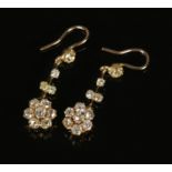 A pair of gold and diamond cluster drop earrings. Approximate weight of diamonds 3.5ct. 6.52g.