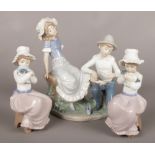 Three Nao figures. Including figure group of young boy and girl, two figures of seat girl with
