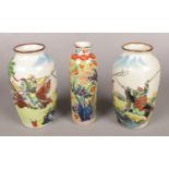 A collection of Chinese ceramics. Includes Qing dynasty clobbered bottle vase and a pair of vases