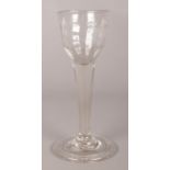 A George II wine glass with folded foot. 15cm.