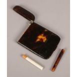 A Victorian tortoise shell cigarette case with hinged snuff compartment. Three small chips to case.