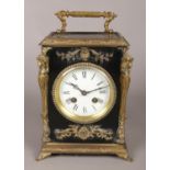A lacquered eight day bracket clock with ormolu mounts.