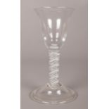 A George III wine glass with opaque double series air twist stem and folded foot. 11cm.