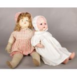 A Early 20th century Effanbee doll with voice box (70cm length) & one other doll.