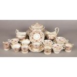 A collection of 19th century Derby tea and dinnerwares with crimson and gilt decoration.