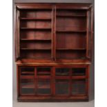 A Victorian mahogany library bookcase with glass sliding doors to base.