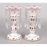 A pair of Bohemian style overlaid glass lustres.
