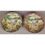 Two large 20th century Japanese chargers. Both with landscape decoration and figures.