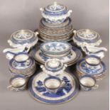 A quantity of Booths dinner/teawares in the 'Real old Willow' design. Including tureens, teacups,